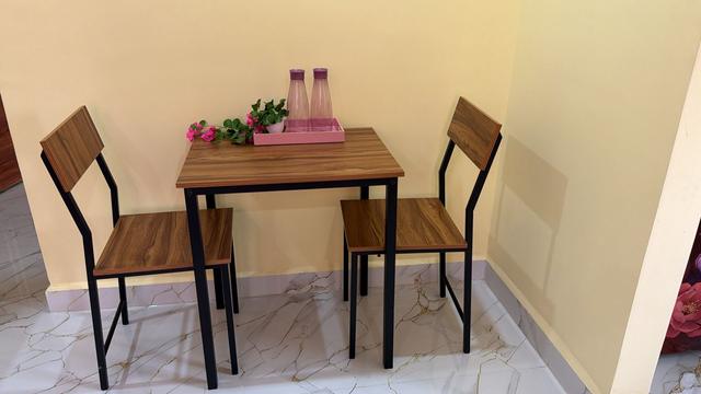 Two-seater dining table with chairs