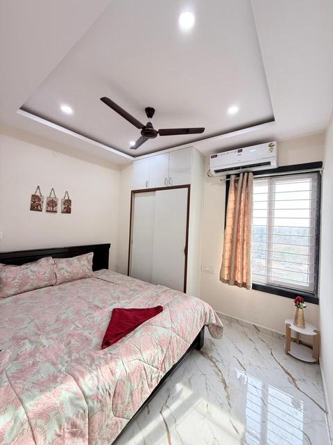 Bedroom with double bed, AC and window