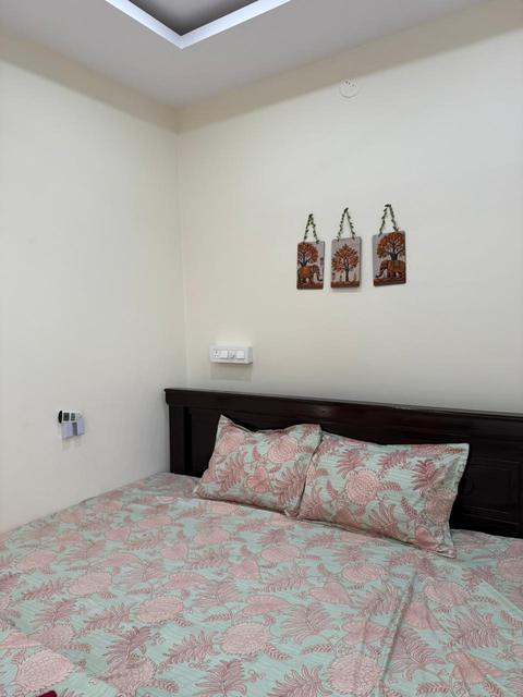 Double bed with floral bedding