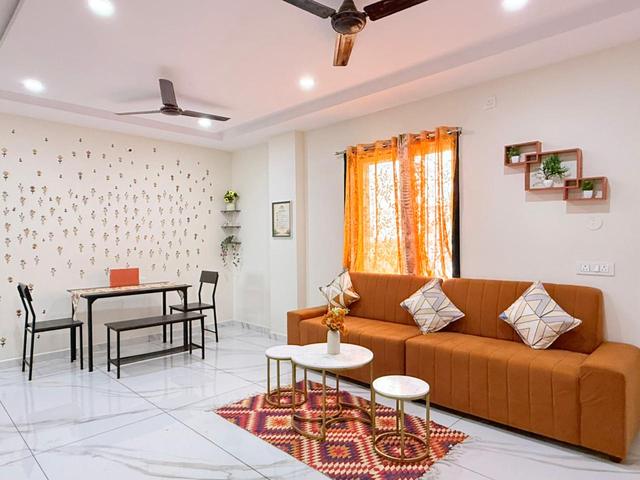 Open living and dining area in the Gowlidoddi penthouse