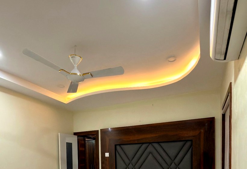 Konda's — Amber lit master bedroom